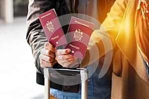 Red Moldavian biometric passport id to travel the Europe without visas. Modern passport with electronic chip let Moldavians travel