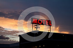 Red Motel Sign with Brilliant Sunset