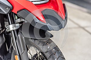 Red motorbike detail on wheel