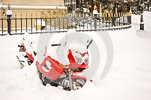 Red Motorcycle Covered Snow