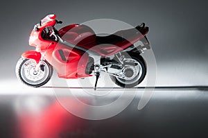 Red motorcycle and dark background