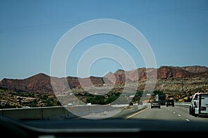 Red mountains Utah.  View from the highway from car.