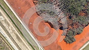 Red mud, bauxite residue, is an industrial waste generated during the processing of bauxite into alumina using the Bayer process