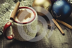 Red mug eggnog and christmas decoration/red mug eggnog and christmas decoration. With copy space