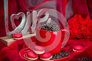 Red mug with macaroon rosted coffee beans sexy red background and Love letter photo