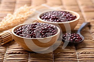 Red mung bean or Azuki bean in wooden bowl with spoon