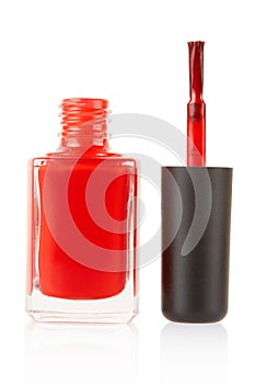 Red nail polish bottle with brush