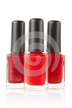 Red nail polish bottles group