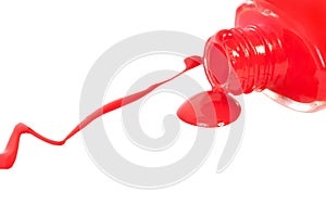 Red nail polish spilled. Isolated on white.