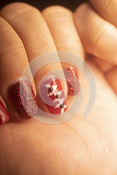 Red nail varnish nails