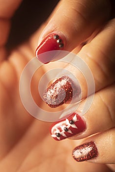 Red nail varnish nails