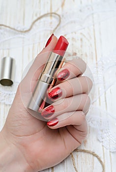 Red nails and red lipstick