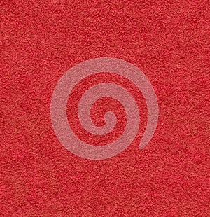 Red natural plush textured fabric macro background closeup texture