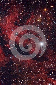 Red nebula in the night sky