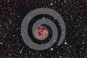 Red nebula in the night sky