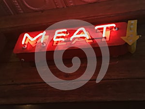 Red neon meat sign