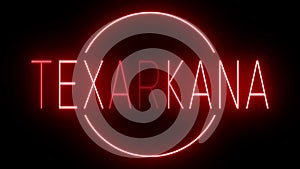 Red neon sign for the city of Texarkana