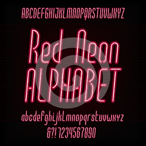 Red neon typeface. Modern oblique alphabet. photo
