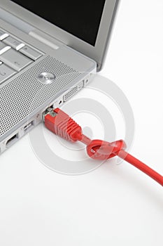 Red network cable with knot