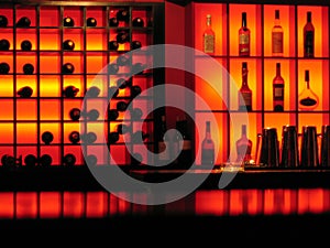 Red nightclub bar glowing bottles background