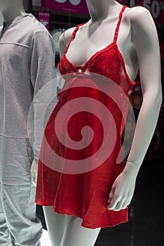 red nighty on mannequin  in underwear fashion store showroom