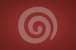 Red nylon fabric texture background.