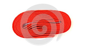 Red nylon rope on white background. Fabric rope in red color folded in a coil