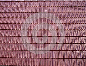 Red oblong roofing tiles.