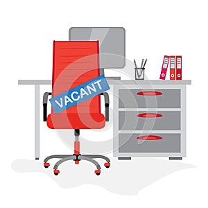 Red office chair with sign vacant on the background with computer table. Hiring job, recruiting or vacancy concept