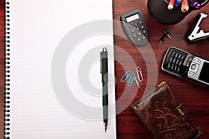 Red office desk with stationery