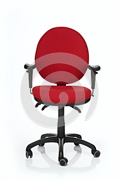 Red office swivel chair against white background. Front view