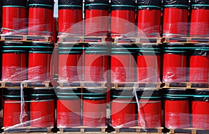 Red oildrums on pallets photo