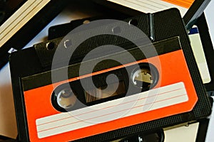 Red old audio cassette background. 80s-90s. Close-up