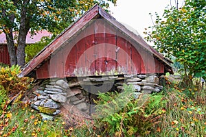 Red old root cellar at the country