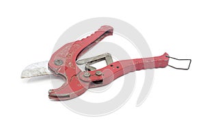 Red old scissors for cutting plastic pipe