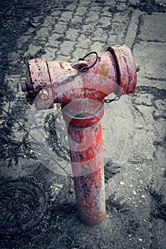 Red old water pump for fire hydrant