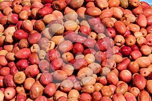 Red olives for sale at market. Skoura. Morocco