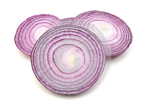 Red onion rings on white background