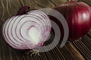 Red onion on a rustic tree