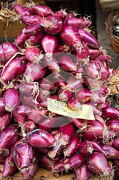 Red onions at the greengrocer in Tropea