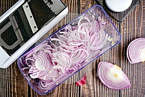 Red Onions Sliced Thinly with a Mandoline photo