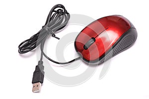 A red optical wired USB computer mouse against a white backdrop