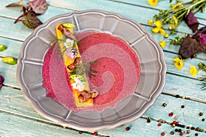 Red orach soup with sour cream photo