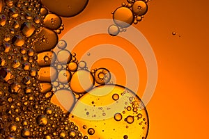 Red orange abstract background with bubbles oil. close up
