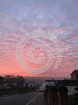 Red and orange cloud formations at sunrise in Rochester, United Kingdom
