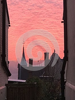 Red and orange cloud formations at sunrise in Rochester, United Kingdom