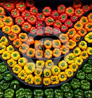 Red,orange and green pepper lay down on showcase healthyfood organic photo
