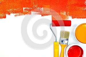 Red and orange paint can, brush and roller flat view