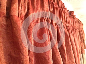 Red-orange valance window treatment