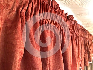 Red-orange valance window treatment